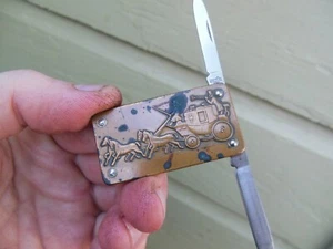 VINTAGE IMPERIAL BRASS STAINLESS MONEY CLIP POCKET KNIFE WELLS FARGO STAGE COACH - Picture 1 of 7