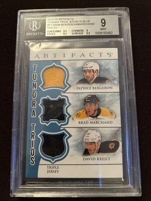 2012-13 Artifacts Tundra Trios Jersey Blue TT3-BKM Bergeron Marchand Krejci BGS9 - Image 1 of 2