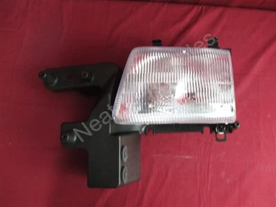 OEM Dodge B1500, B2500, B3500 Headlamp Assembly 2001- 03 Left Hand 55076525AC - Image 1 of 4