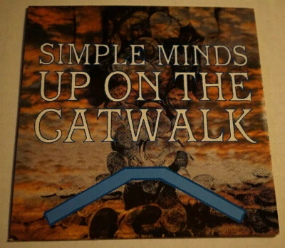 Simple Minds Up On The Catwalk/A Brass Band In Africa Uk 7” 1984 New Old Stock - Image 1 of 4