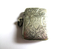 A VICTORIAN SILVER VESTA CASE ,HALL MARKED IN VERY GOOD CONDITION ENGINE TURNED.