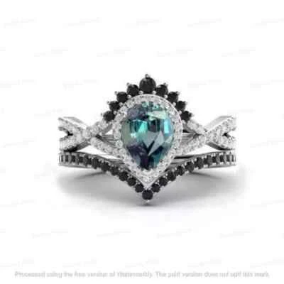 Juego de anillo de compromiso de moissanita topacio corte pera de 3 quilates acabado oro blanco de 14 quilates Foto 1 de 4