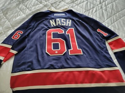 Camiseta deportiva Reebok azul alternativa firmada por Rick NASH de los New York Rangers Foto 1 de 2