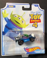 Hot Wheels Voiture Jouet Toy Story 4 Alien Mattel GCY55 à Partir De 3 Années
