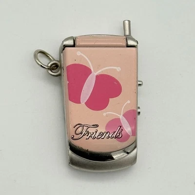 Silver & Pink Cellular Flip Phone Digital LCD Key Chain Watch, Semi-Working - Image 1 of 4