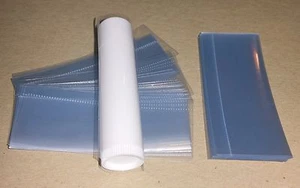 50 klare SCHRUMPFFOLIENBÄNDER für Lippenbalsam (Chapstick) Tuben VERTIKALE PERFORATION - Bild 1 von 1