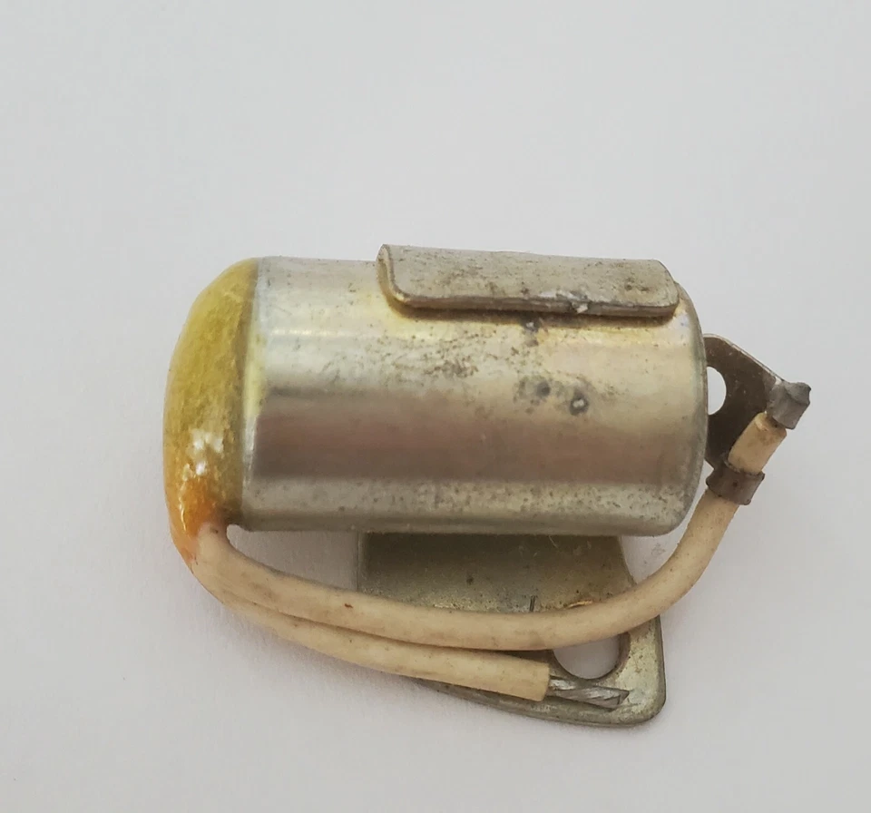 НОВЫЙ ИЗ СТАРЫХ ЗАПАСОВ OEM SUZUKI ЛЕВЫЙ КОНДЕНСАТОР 31642-11011 T200 T20 TC200 TC250 - Изображение 1 из 1