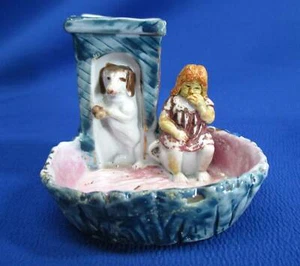 UNUSUAL GERMAN MATCH SAFE BOX STRIKER VESTA FIGURAL GIRL ON POTTY & DACHSHUND - Picture 1 of 7