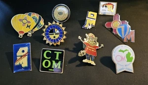 10 Odyssey of the Mind Sammelpins New Mexico, Mississippi, Connecticut & - Bild 1 von 2