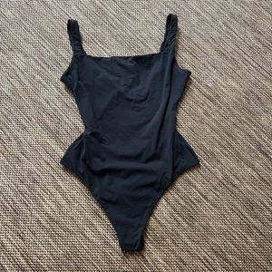 Skims Stretchy Black Tank Body Damen Basics Tanga XS - Bild 1 von 4