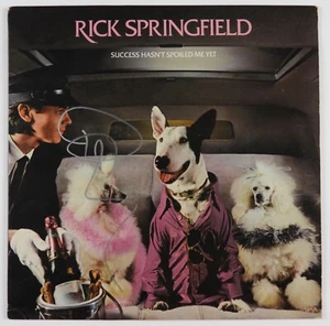 Rick Springfield JSA Autogramm signed Album Vinyl Schallplatte Erfolg hat nicht verdorben - Bild 1 von 3