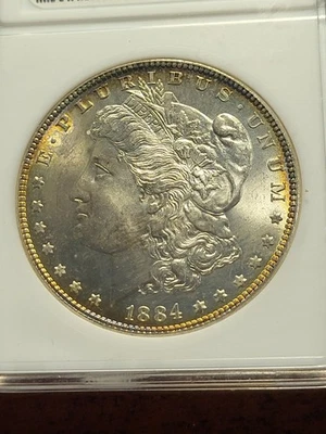 1884 Morgan Silver Dollar, ANACS MS65, Philadelphia, toned     inv11    g27ml - Image 1 of 4