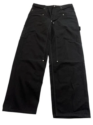 Pantalones de carpintero con tachuelas Givenchy en negro Foto 1 de 4