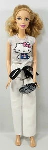 Barbie Puppe & Zubehör hellbrünette Haare braune Augen HELLO KITTY Mattel - Bild 1 von 5
