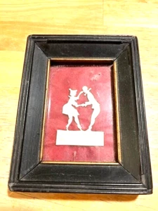 LATE 1800S EARLY 1900S SILHOUETTE OF 2 PEOPLE THAT HAS BEEN CUT OUT OF COW BONE - Picture 1 of 3