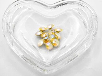 Diamantes de imitación Swarovski 1088 Xirius Chaton Yellow Opal Shimmer F (39ss - 8 mm) Foto 1 de 4