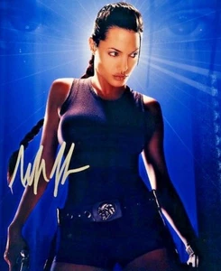 ANGELINA JOLIE ORIGINAL TOMB RAIDER SIGNED 8 X 10 PHOTO - Bild 1 von 2