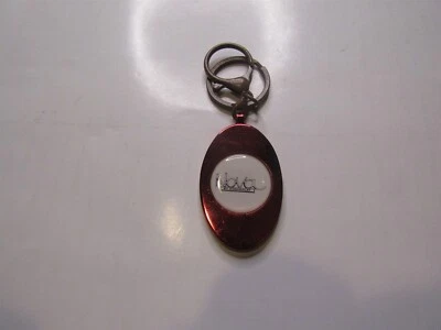 LLAVERO CHEVROLET NOVA EMBLEMA GUARDABARROS ESCRITURA LOGOTIPO NOVA CROMO ROJO Foto 1 de 2