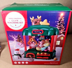 NUEVO AIQI Feliz Navidad Funcional Garra Máquina Set Luces Música Juguete Niños 3+ Años - Imagen 1 de 5