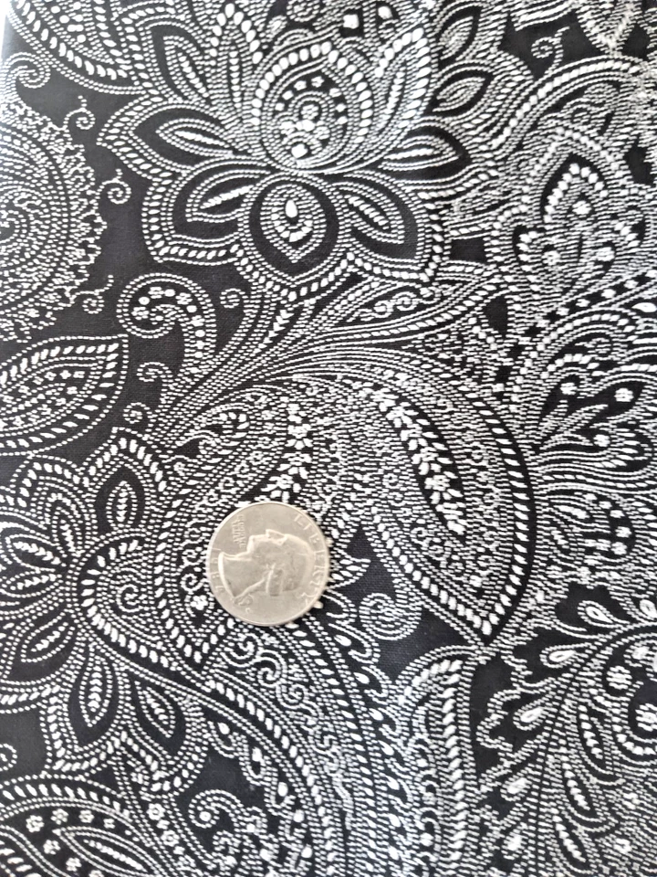 Black paisley print cotton remnant, 18.5 in. by 44 in. made by Moda. - Image 1 of 2