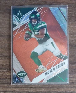 Michael Carter New York Jets 2022 Panini Phoenix Football Orange Lazer /75 - Bild 1 von 3