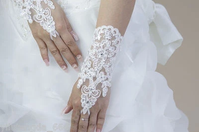Elegantes guantes de boda nupcial con estrás de párrafo corto de encaje sin dedos de fiesta Foto 1 de 2