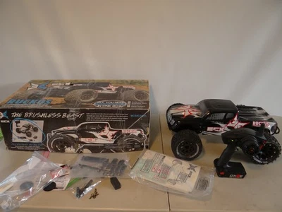 ECX Ruckus 1/10 2wd Monster Truck Race Car  in box - Image 1 of 4