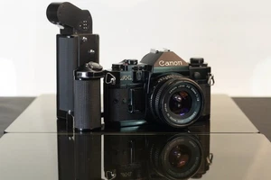 Canon A-1 avec son Canon Lens 50 mm / 1:1.8 + moteur poignée - Picture 1 of 18