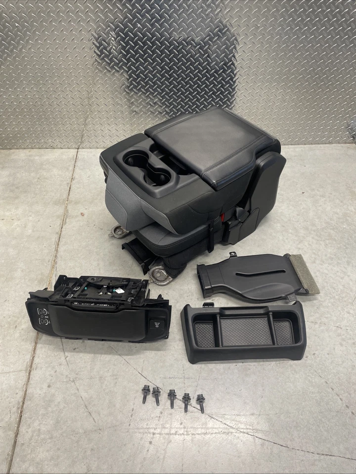 RAM 1500 2019-26 quinta cabina doble tela centro delantera asiento reposabrazos almacenamiento Foto 1 de 4