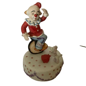 Melodies In Motion Send In The Clown Moving Porzellan Figur Hund Einrad Wind - Bild 1 von 6