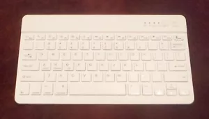 ULTRA THIN BLUETOOTH 3.0 KEYBOARD TESTS GOOD WORKS WITH ANDROID - Picture 1 of 3