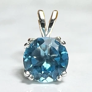 Round Natural Swiss Blue Topaz Set In Sterling Silver Double-Prong Tulip Setting - Picture 1 of 8