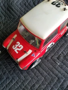 Coche RC Tamiya Mini Cooper Racing rojo y blanco para piezas - Imagen 1 de 12