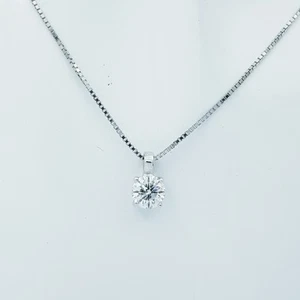 CIONDOLO DIAMANTE PUNTO LUCE in ORO BIANCO 18 kt 0.75 ct G VS1 - Foto 1 di 3