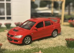 WELLY 1/60 Mitsubishi EVO - Picture 1 of 9