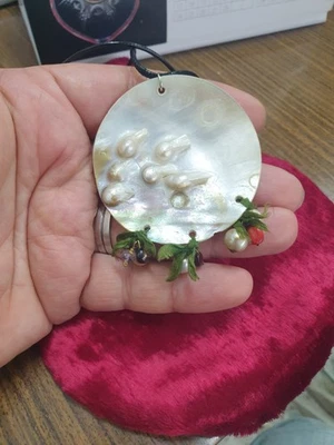 collar de perlas en caparazón de nácar Foto 1 de 4