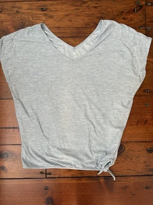 Camisa deportiva Kyodan mediana para mujer Foto 1 de 3