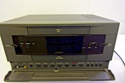 VCR de doble cubierta GoVideo GV-6010/6100/6150 con rebobinado automático y salto comercial Foto 1 de 4