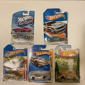 Hot Wheels 5 Stück Neu Mit Verpackungsschaden. Firebird, Mitsubishi Pajero, Camaro - Bild 1 von 9