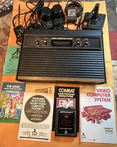 Atari 2600 Video Computer System 4 Switch Woodgrain 1 Joystick Paddles Combat - Picture 1 of 6