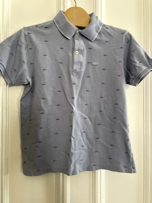 Polo Lacoste de segunda mano lavanda/logotipos, mangas cortas 14 adolescentes unisex.  Foto 1 de 3