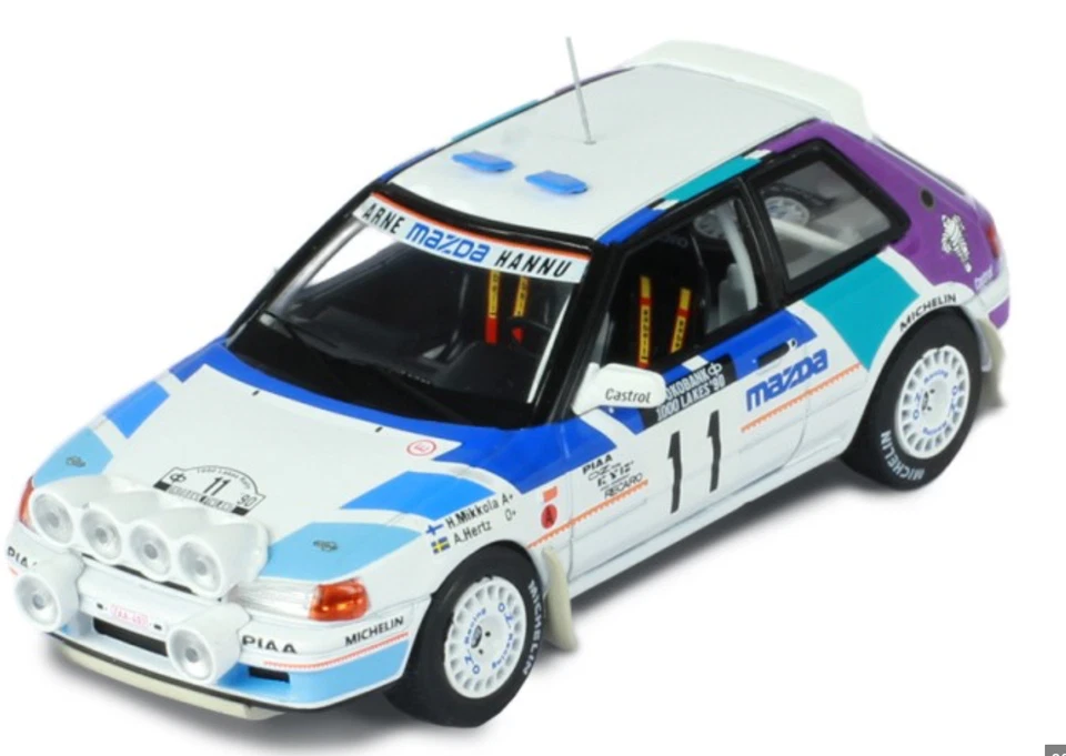 1/43 MAZDA 323 GT-X #11 RALLY 1000 LAKES 1990 MIKKOLA HERTZ IXO RAC358B - Immagine 1 di 1
