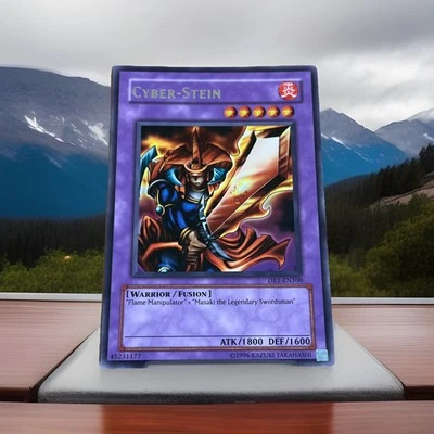 RARE Yu-Gi-Oh! Flame Swordsman/Cyber-Stein Wrong Name Misprint DB1-EN100 - Image 1 of 4