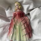 China lady pink and green dress blonde hair old mended