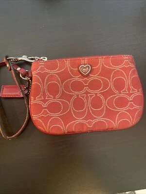 Muñequera de amapola rosa Coach Foto 1 de 3