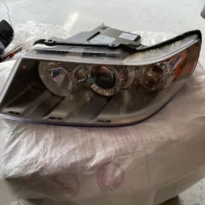 ✅2005-09 Saab 9-7X HALOGEN NOS Headlight Lamp Bulb Left OEM - Picture 1 of 10