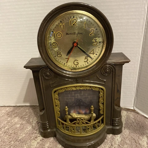MASTERCRAFTERS Model 272 FIREPLACE Animated Lighted Motion Clock 1950's Works Cover