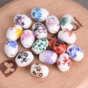 Lotto 20 pezzi 10x8 mm forma ovale pittura floreale ceramica porcellana perline sfuse fai da te - Foto 1 di 21