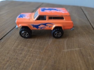 1980s Majorette Movers 4x4 Jeep Cherokee Wagoneer #236 Orange w Flames - Picture 1 of 5