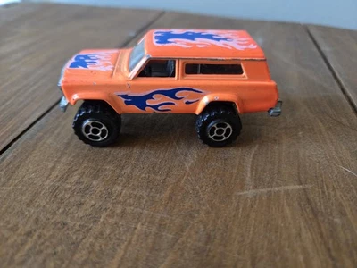 1980s Majorette Movers 4x4 Jeep Cherokee Wagoneer #236 Orange w Flames - Image 1 of 4